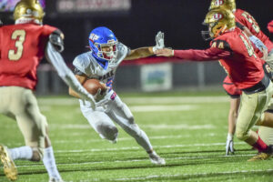 Mitchell and Barner duke it out on the ground, No. 8 Wheeling Park breaks away in second half to beat Hawks 41-28